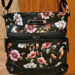 ROSETTI CONVERTIBLE SHOULDER BAG POCKETBOOK 
This black handbag has the look of a hand painted flowers on it. It is a nice cross body. It is brand new