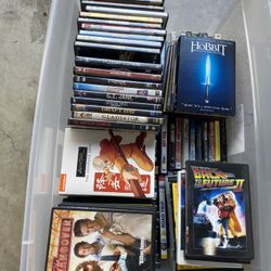 123 used DVD’s for sale Plastic bin is included if you want it