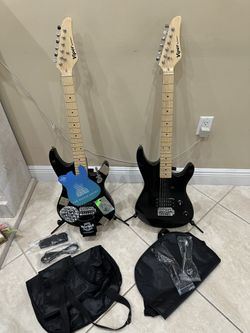 2 Brand New Never Used Guitars