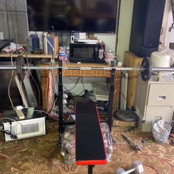 Bench Olympic bar and   50 pounds of weight
