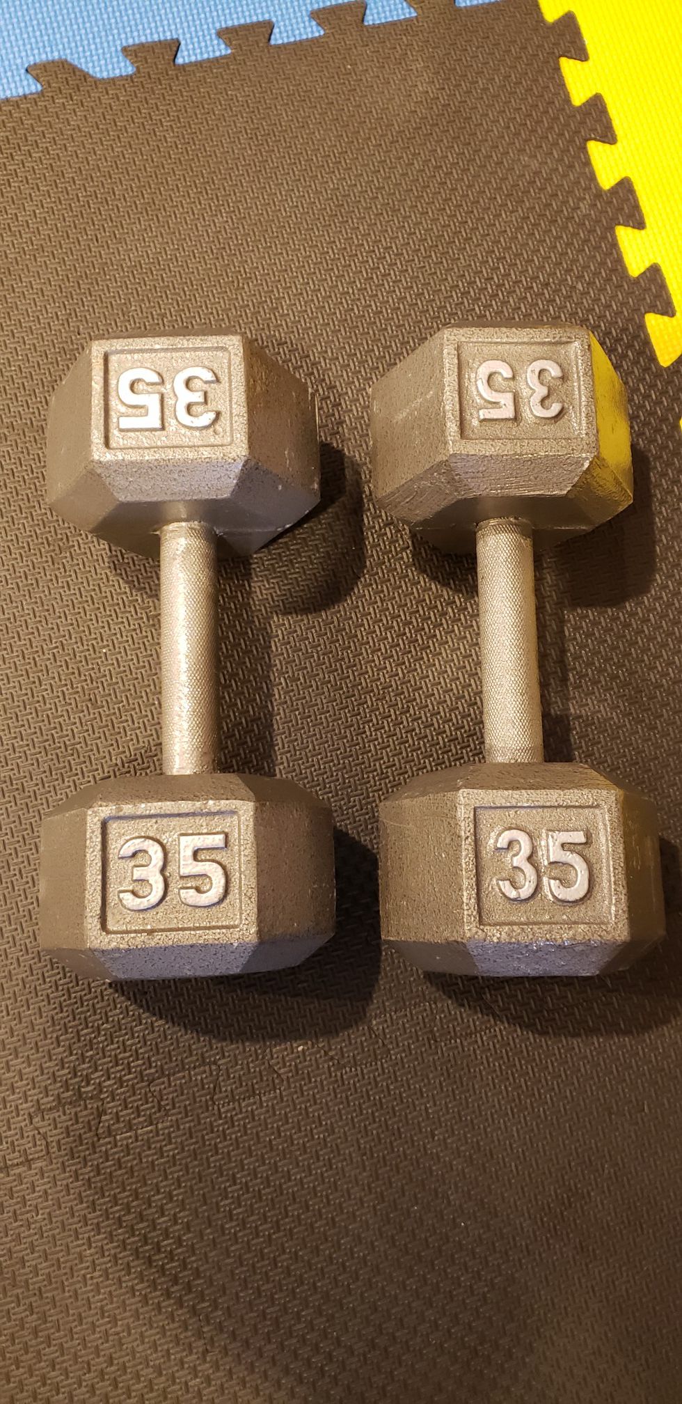 Pair of 35 lbs iron casted hex dumbbells