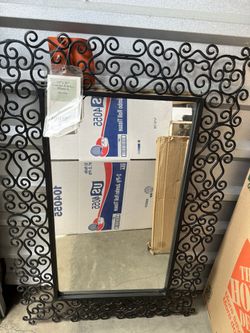 World market Black Metal Iron Scroll Mirror $35