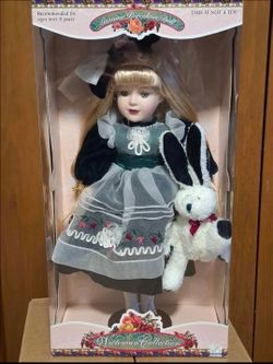 Victorian porcelain doll with Bunny