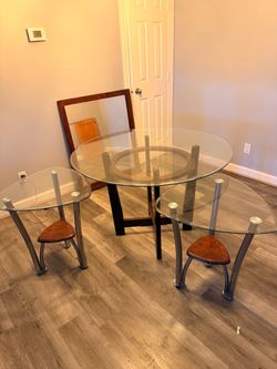 1 Glass dinner table and 2 side end tables with 34”x 39” mirror