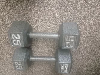 2 Cast iron 25 pound dumbells