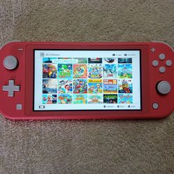 NINTENDO SWITCH LITE (Modded) With 125 SWITCH GAMES and 7000 CLASSIC GAMES 