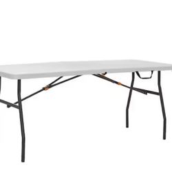 6 FT HDX foldable table. 4 Legs Dining Table Seats 6