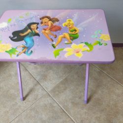 Tinkerbell & friends TV tray/activity table
Still works well. Top of the table has some wear as shown in pictures. 