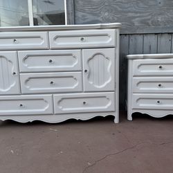 Solid wood dresser set one long dresser and one night stand in good condition all drawers open just fine