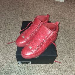 Balenciaga Arena High-Top Sneakers in red. 
