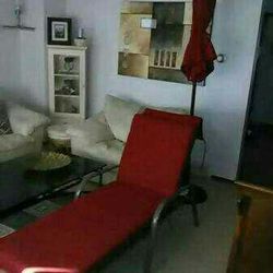 Lounger chair w/cushion and umbrella w/stand! Like New! 