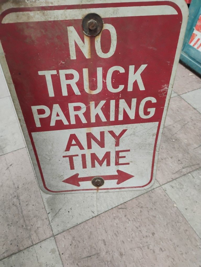 No truck parking metal sign