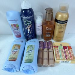 Beauty Bundle Take All For Price Listed. Burts Bees Chapsticks, Tarte Shape Tape Concealers, Deodorants, Sun Tanning Bronzers And Glitter Body Spray. 