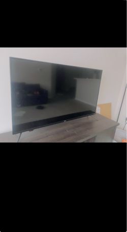 55 inch Roku tv and Tv stand