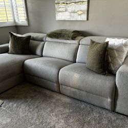 Light Gray Reclining Sectional Sofa – Includes Pillows & Blanket