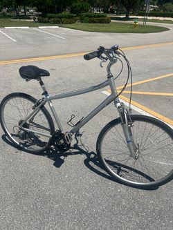 Men’s Large - Raleigh Hybrid - Comfort bike  . Front Suspension & Seat post. Gel Seat / Upright Bars Comfort