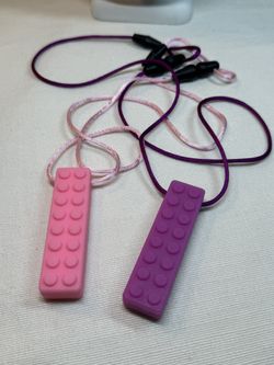 Set of Two Silicone Sensory/Teething Biting Blocks. Price is for both.
