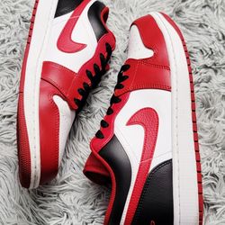 Size 10 Nike Air Jordan 1 Low “Reverse Black Toe” 553558‑163.

