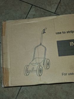 New striping machine bought it never use box close