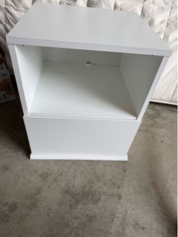 White dresser and bedside table