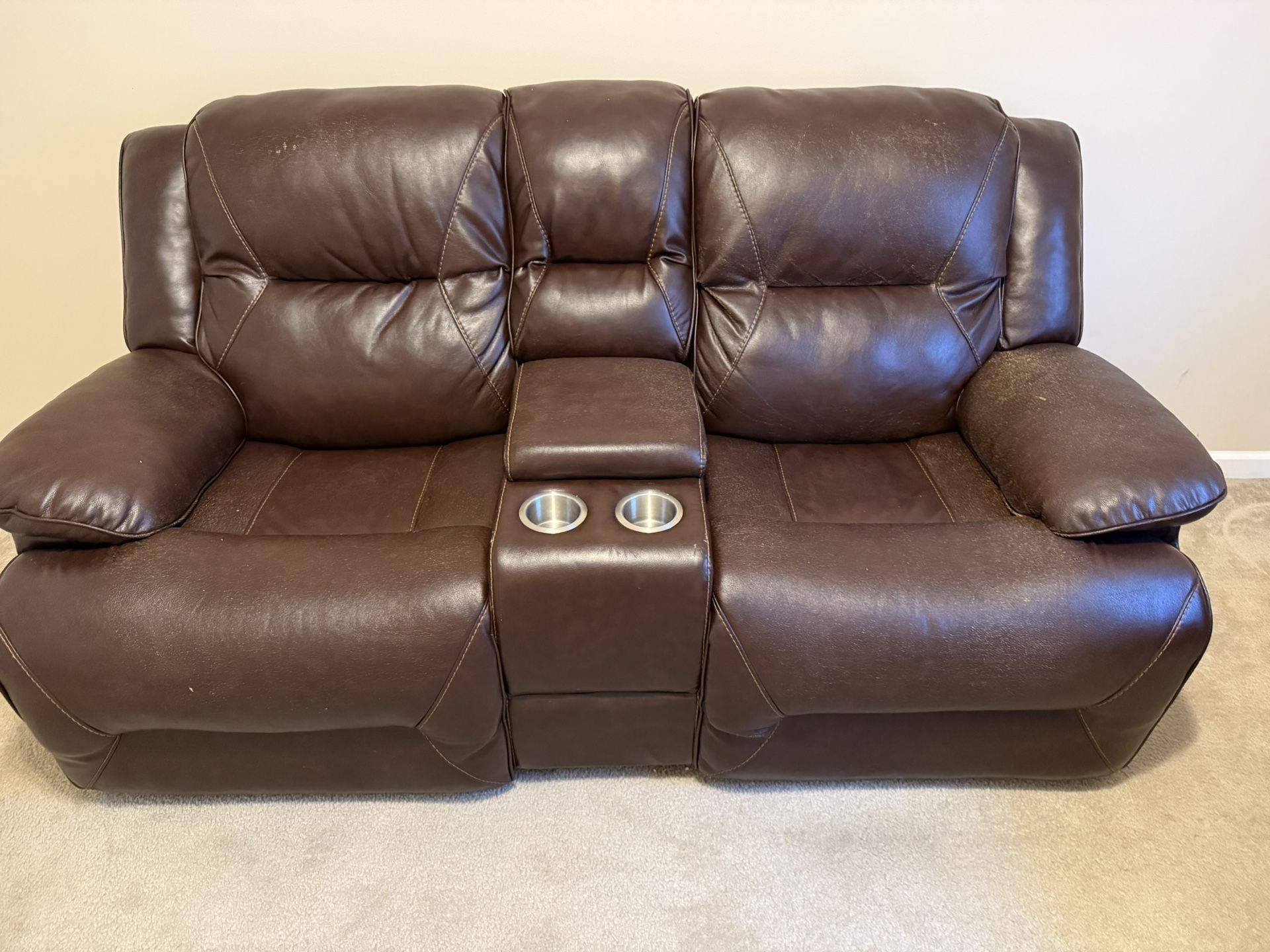 Leather electric reclining loveseat