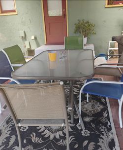 Glass table that can sit up to 6 people
