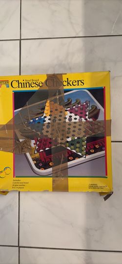 Vintage 1980s Chinese checkers with a metal board