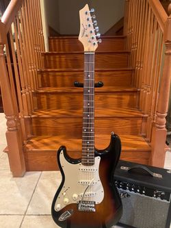 Johnson Left Handed Stratocaster w/ Fender Amp