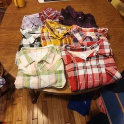 BUNDLE OF PLUS SIZE 3X FLANNEL SHIRTS. MOST NEW WITH TAGS.