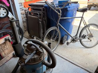 Bike, vacuum and patio chairs