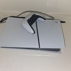 PlayStation 5 with controller