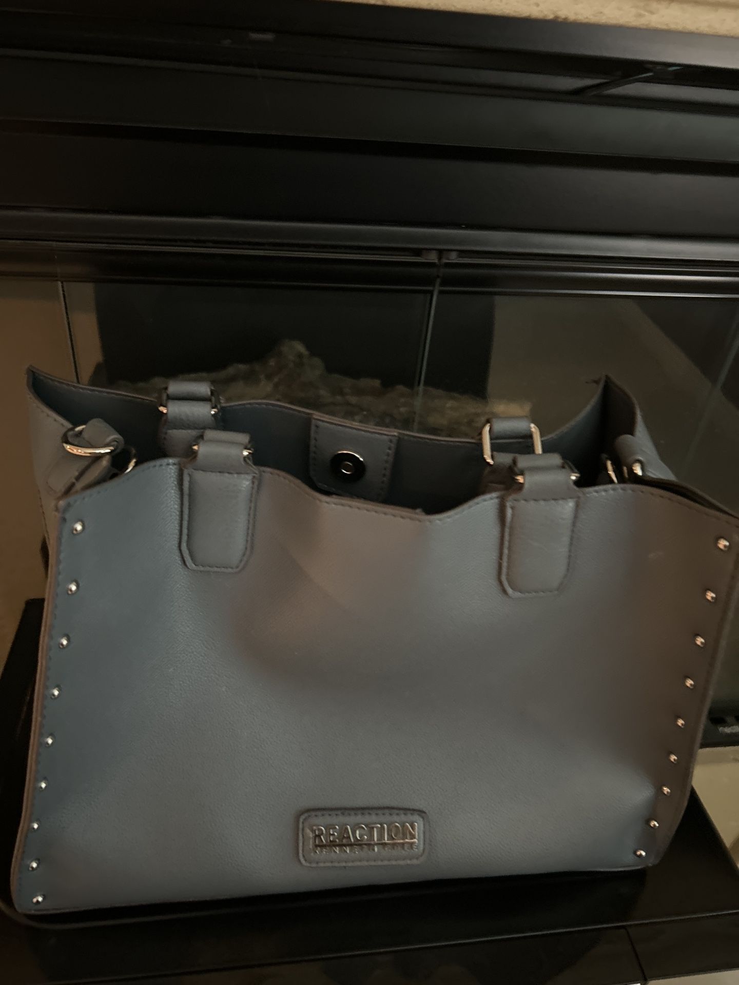 cription: Beautiful red leather handbag in great used condition.