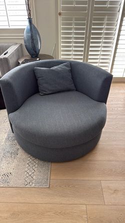 Beautiful blue swivel love seat