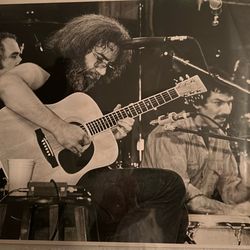 Photograph Of Jerry Garcia Playing Acoustic Guitar