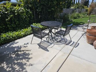 Patio table and 3 chairs