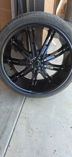 22 inch black rims and tires