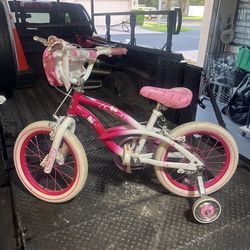 Cute Hello Kitty bike with trainers