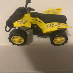 Yellow toy ATV