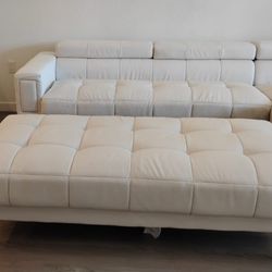 Foux Leather Couch and Ottoman.
