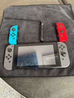 Nintendo Switch Console with Joy-Con Controllers