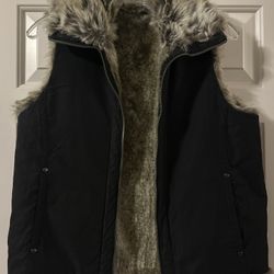 New. Weatherproof Garment Company reversible black and faux fur vest - size small