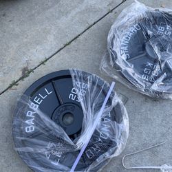   Very nice looking Brand new 45 and 35 lb Olympic weight plates.  Pair of 45s =$120 Pairs of 35s=$100