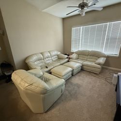 Cream Leather Living Room Set – Sofa, Loveseat, Armchair & 2 Ottomans