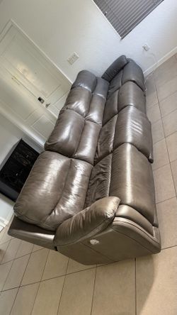 Leather sofa recliner