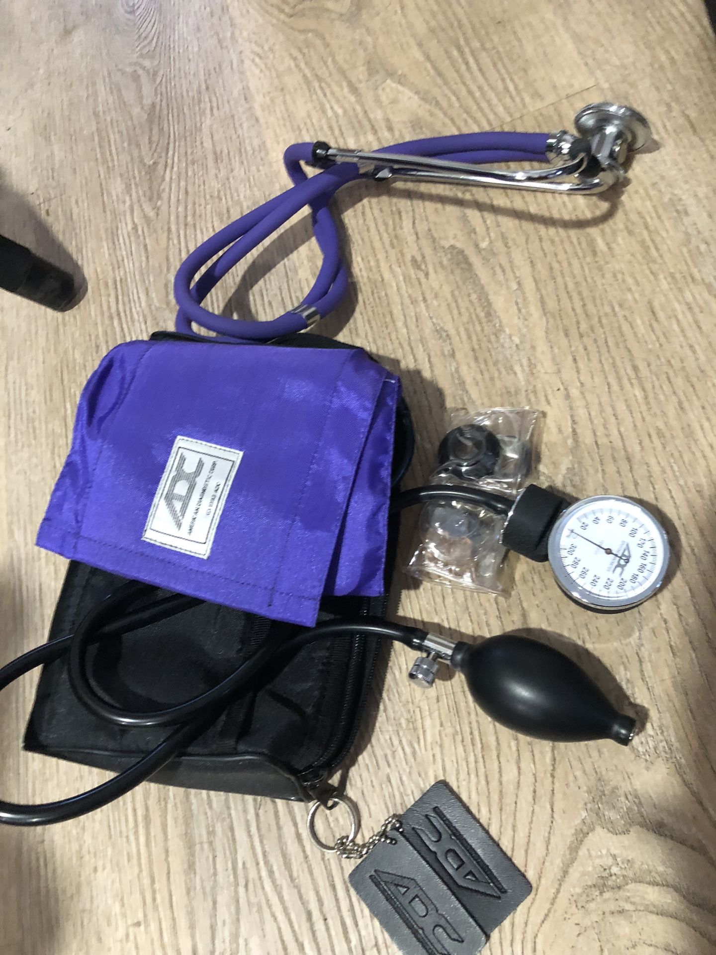 ADC Diagnostix 778 Pocket Aneroid Sphygmomanometer with an Adcuff Nylon Blood Pressure Cuff and a stethoscope