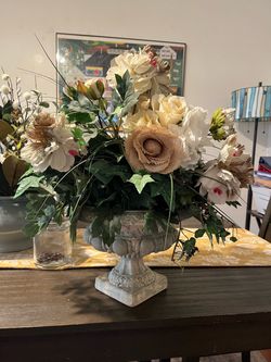 Flower arrangement. Various flowers. Very heavy pot