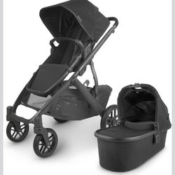 UPPAbaby Vista V2 Stroller / Convertible Single-To-Double System / Bassinet, Toddler Seat, Bug Shield, Rain Shield, and Storage Bag Included / Jake (C