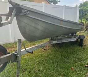 12 foot aluminum boat and trailer.