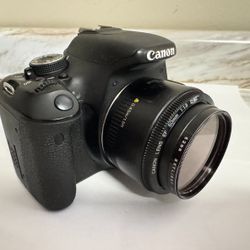 Canon EOS Rebel T3i DSLR Camera Kit w Canon EF 50mm f/1.8 II Lens + Battery, Charger and Bag