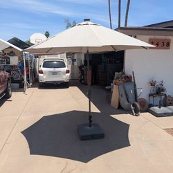 (2)10' Wide Solar/Tilting Umbrellas with HD 80lb. Bases